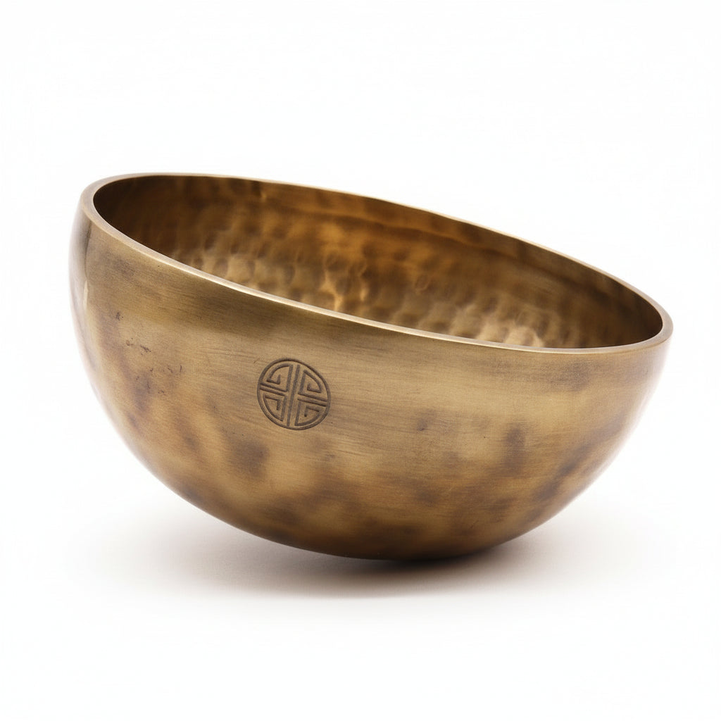Extra Large Handmade Nepalese Moon Singing Bowl - 22cm, showcasing its exquisite craftsmanship and rich, golden tones, perfect for enhancing meditation. Ideal for a Christmas gift or as a unique home decor piece, this bowl embodies tranquility and harmony.