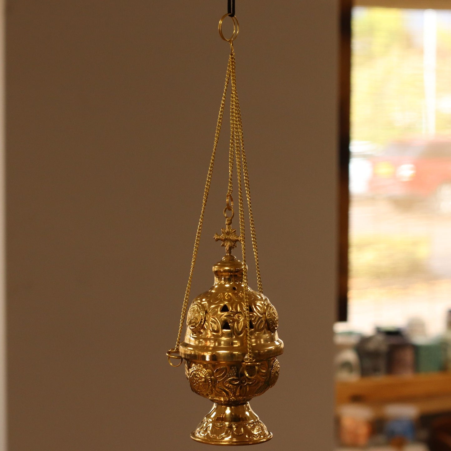 Handcrafted Hanging Brass Incense Burner showcasing traditional elegance. This intricate burner is perfect for enhancing your meditation corner or living room with inviting aromas. Ideal for Christmas gift home fragrance.