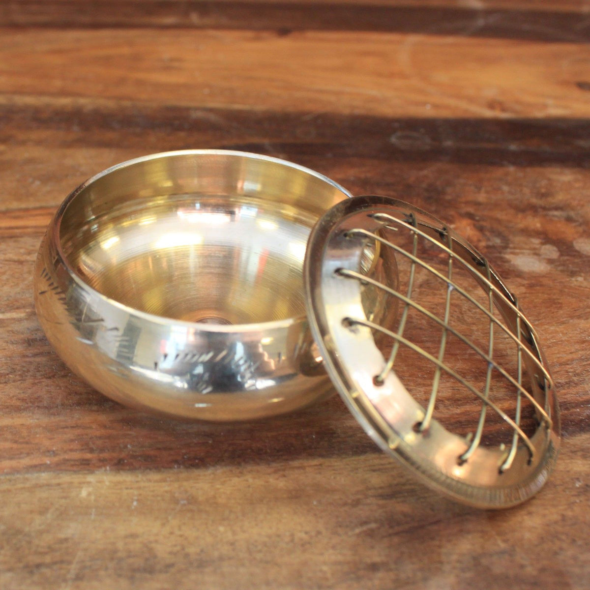 Elegant Brass Charcoal Incense Jar with a removable grid lid, ideal for burning resins and herbs. Perfect for enhancing your home fragrance this Christmas, making it a thoughtful gift. {{scent}} {{product_type}} – Christmas Gift Home Fragrance.