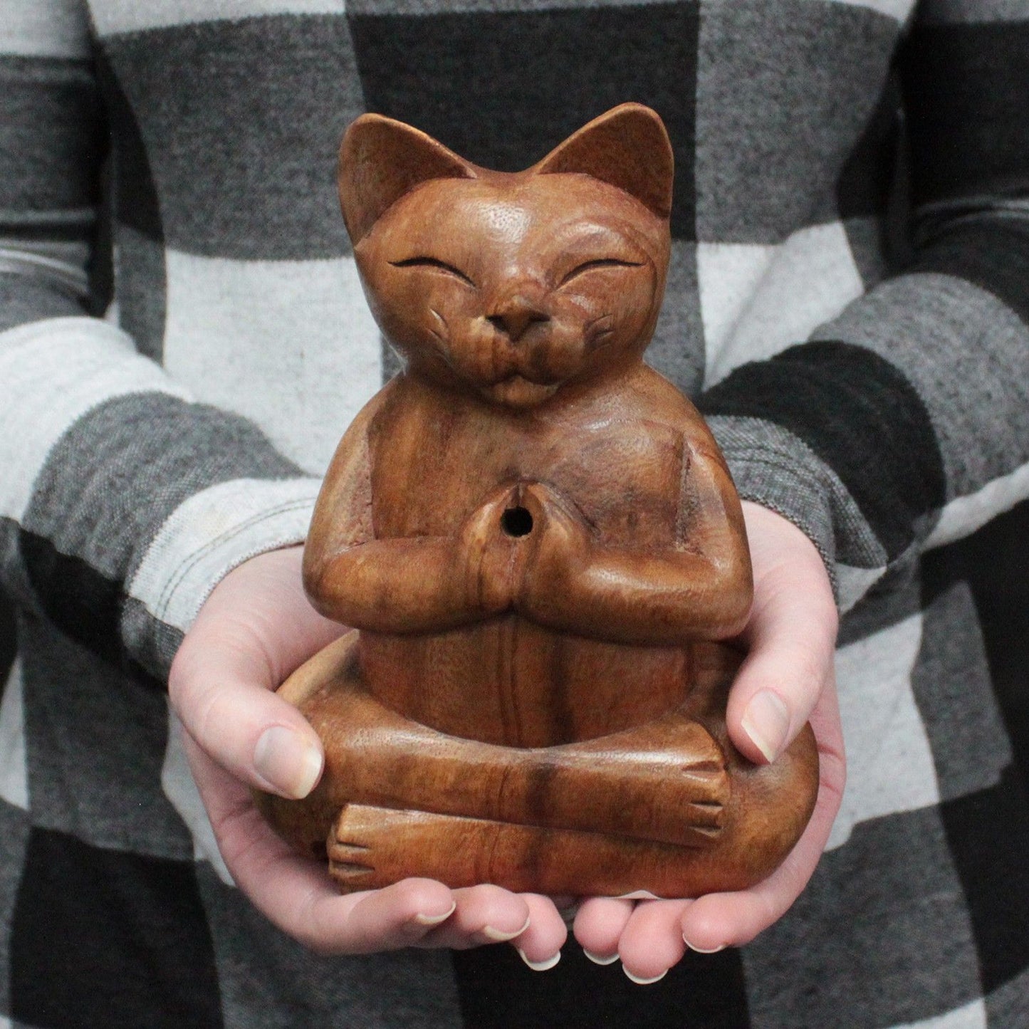 Hand-Carved Yoga Cat Incense Burner held by a person, showcasing its beautiful craftsmanship. This unique incense holder is perfect for cat lovers and makes a wonderful Christmas gift for home fragrance enthusiasts.