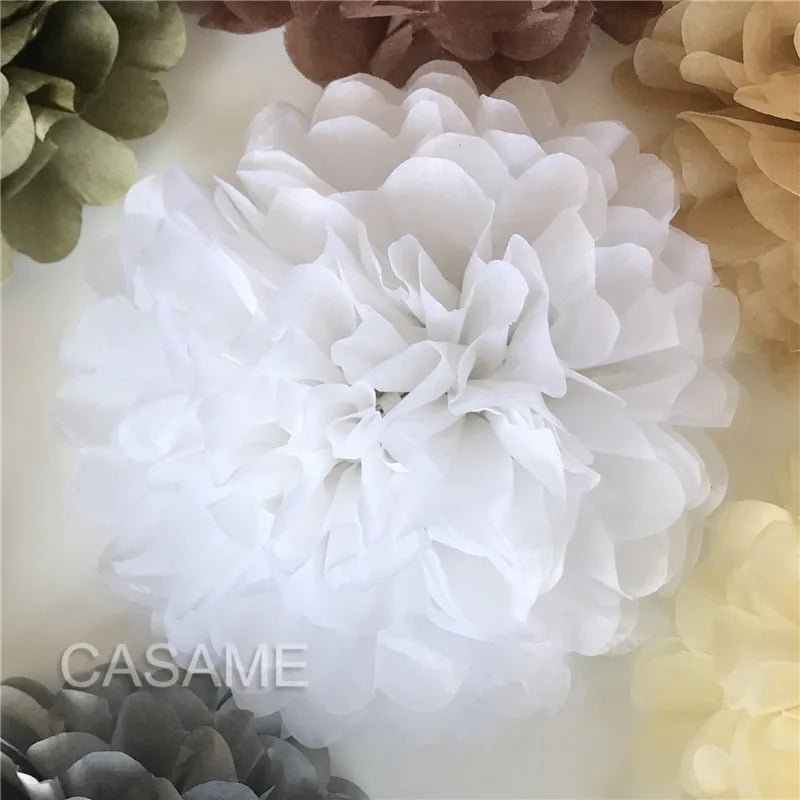 Faron's delightful 15Cm tissue paper pom poms, great for wedding and nursery decorations.