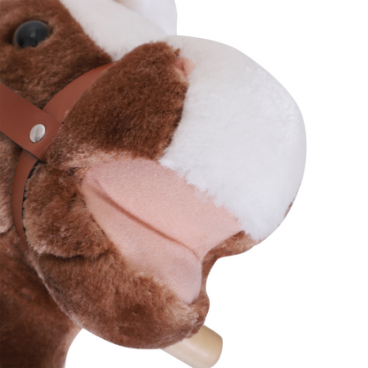 Child relaxing on the Kids Rocking Horse after playtime, a calming toy for pre-nap or post-activity.