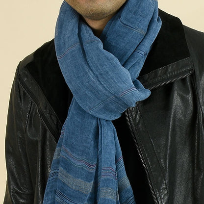 Chic Striped Cotton Linen Scarf styled on a model, emphasizing its soft texture and fashionable design. This lightweight accessory is perfect for a chic winter look or any time of the year. Winter Hats And Scarves.