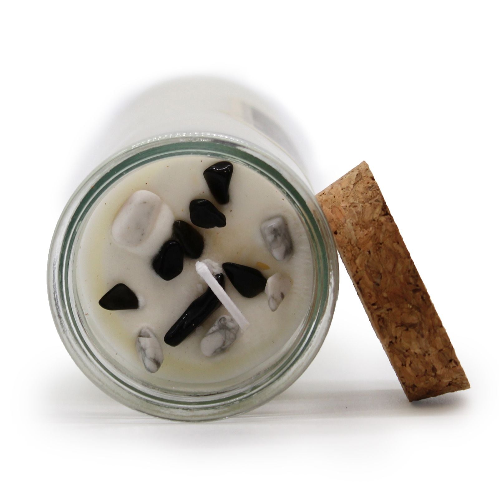 Top view of the Magic Balance Soy Wax Candle with Black Agate & White Jasper, showcasing its embedded gemstones and natural cork lid. This soothing scent candle is perfect for creating a serene atmosphere—ideal as a Christmas gift home fragrance.