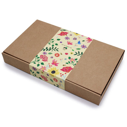Stylish exterior of the Total Detox Salt Soak Set - Aromatherapy Spa Experience with colourful floral band, perfect for any occasion. A thoughtful Christmas Gift Home Fragrance.