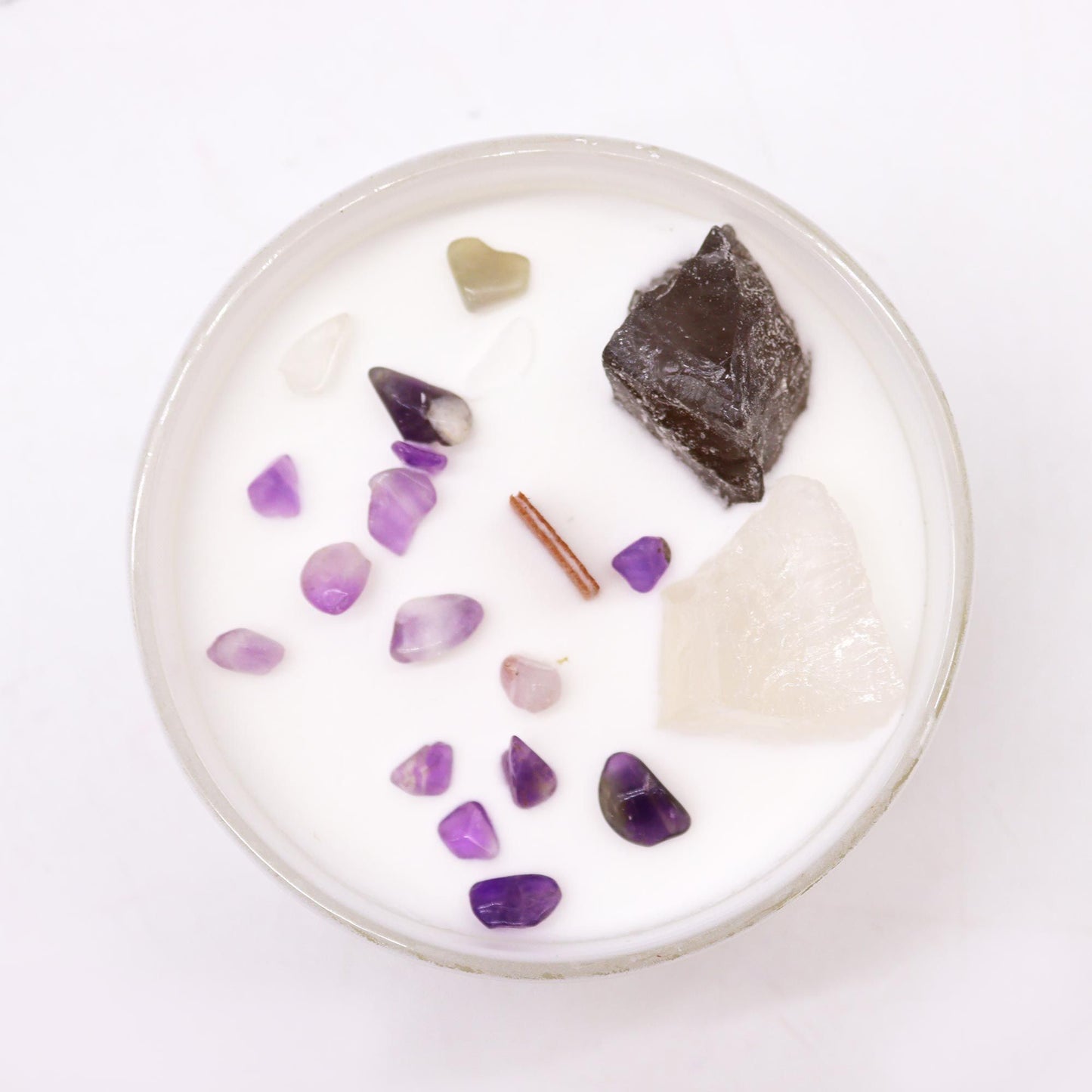 Close-up of Crown Chakra Candle – Ocean Breeze Scent, showcasing crystals like Celestite and Selenite inside. A perfect choice for a Christmas Gift Home Fragrance.