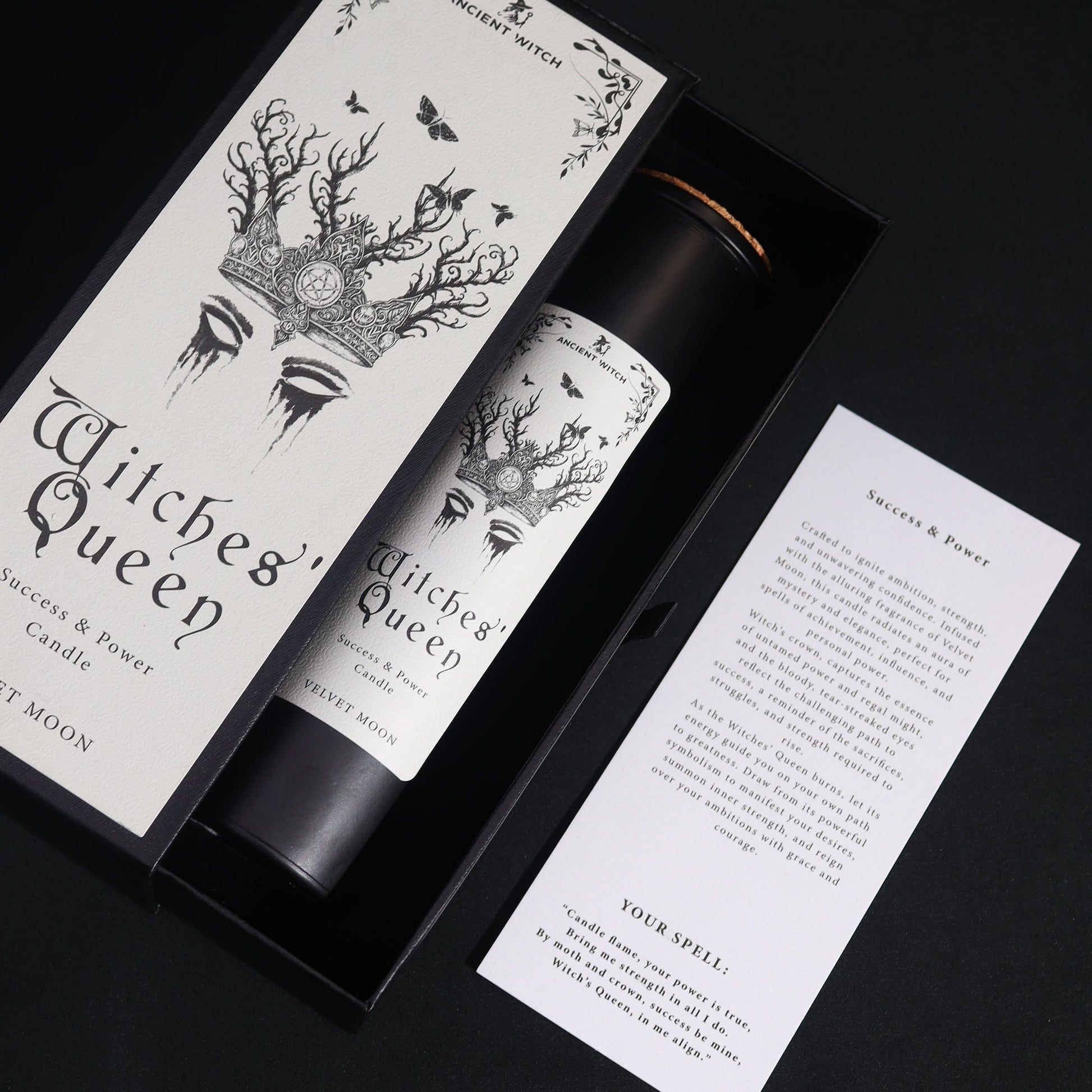 Witches' Queen Candle showcased in an elegant black box, featuring intricate artwork and a spell card for empowerment. Perfect for ambition and empowerment, this Velvet Moon scented candle makes a thoughtful Christmas gift and a delightful home fragrance.