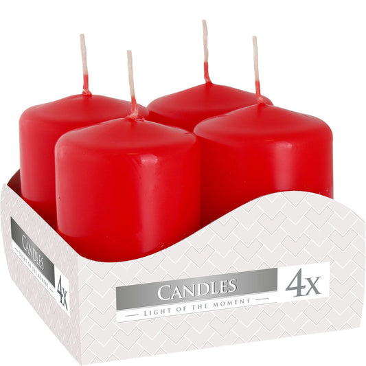 Set of 4 Red Pillar Candles 40x60mm - Perfect Home DÃ©cor. These vibrant red candles, ideal as a Christmas gift, enhance any space with their warm glow, making them a charming choice for festive home fragrance.