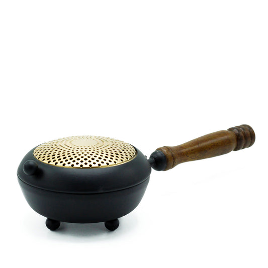 Elegant Large Iron Incense Burner With Gold Accents displayed on a clean surface. This stunning piece serves as a chic and functional {{scent}} {{product_type}} â€“ Christmas Gift Home Fragrance, radiating elegance and style.
