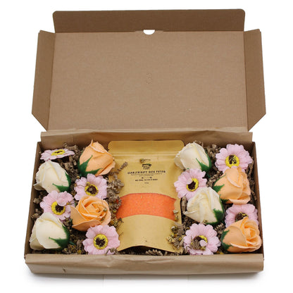 Inside view of the Total Detox Salt Soak Set - Aromatherapy Spa Experience, featuring bath salts and delicate soap flowers, creating a serene atmosphere. A wonderful Christmas Gift Home Fragrance.