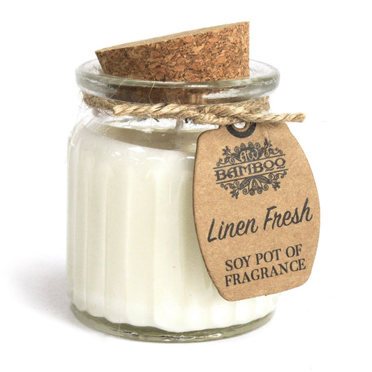 Linen Fresh Eco-Friendly Soy Wax Candle Pot in a reusable glass jar with cork lid, perfect for creating a warm ambience. Ideal as a Christmas gift home fragrance.