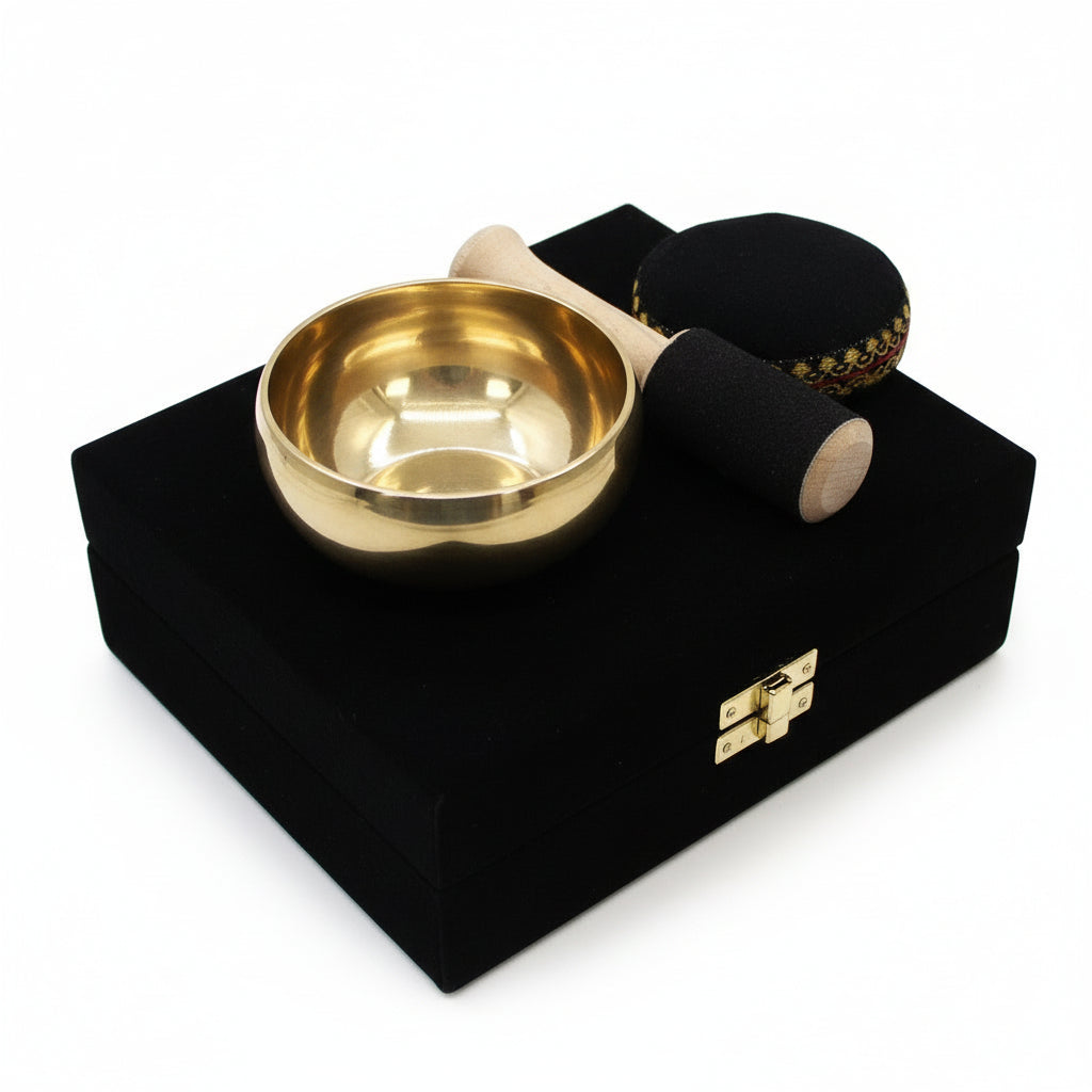 Open view of the Brass Singing Bowl Set - 9cm Tibetan Gift for Inner Calm presented in a luxurious padded box, featuring the bowl, cushion, and stick for a calming experience. This {{scent}} {{product_type}} – Christmas Gift Home Fragrance makes a thoughtful gift.