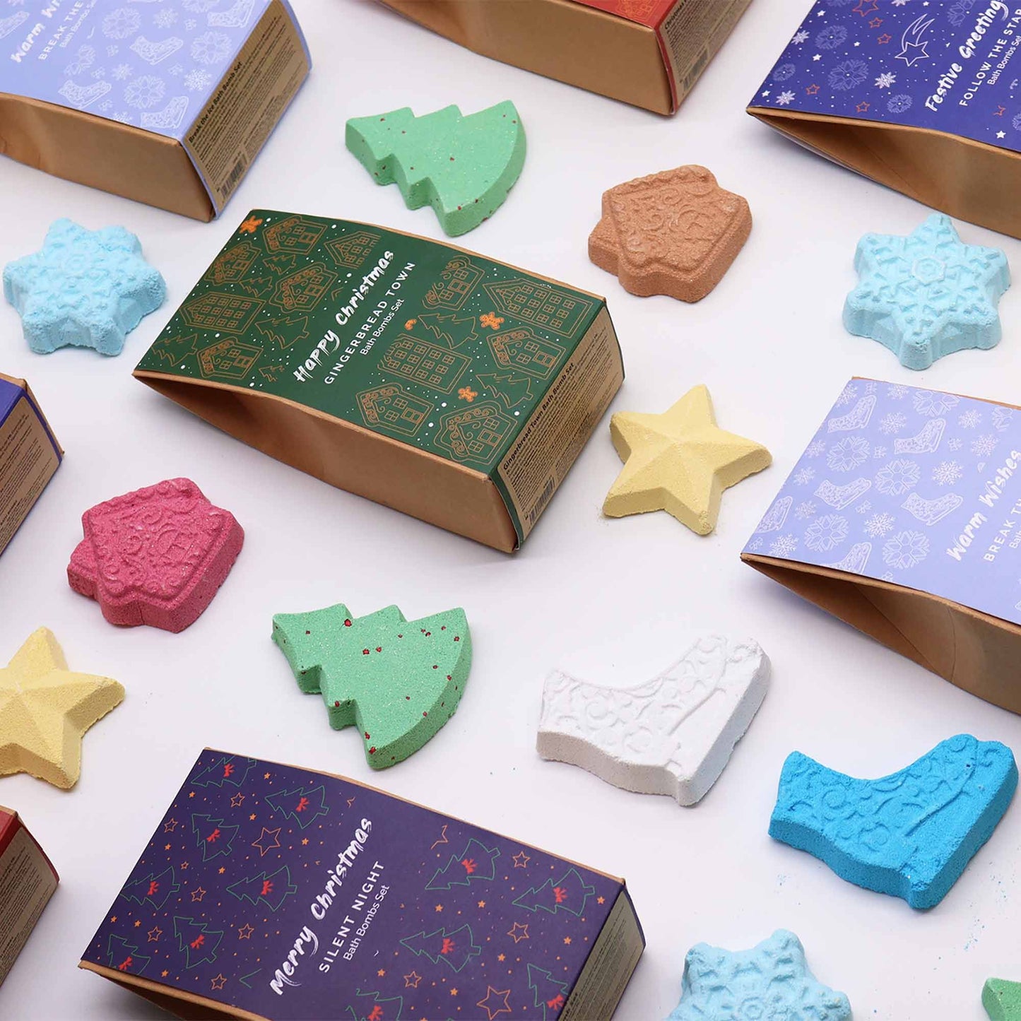 Follow the Star Christmas Bath Bomb Gift Pack showcasing a vibrant array of bath bombs in festive shapes like trees and stars, perfect for creating a joyful Christmas gift home fragrance experience.