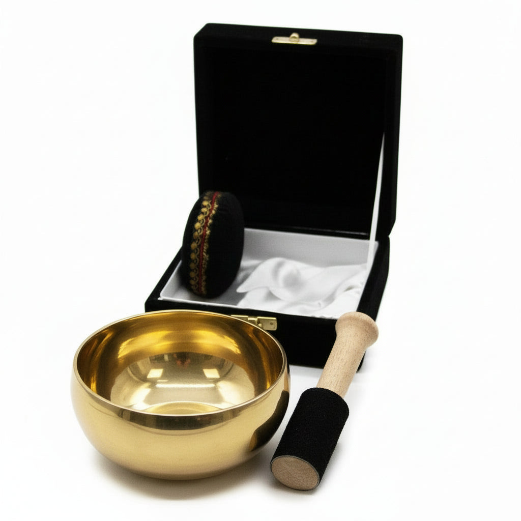 Inside view of the Brass Singing Bowl Set - 9cm Tibetan Gift for Inner Calm showcasing the bowl, cushion, and stick neatly placed in the padded box, ideal for sound therapy. This {{scent}} {{product_type}} – Christmas Gift Home Fragrance cultivates calm.