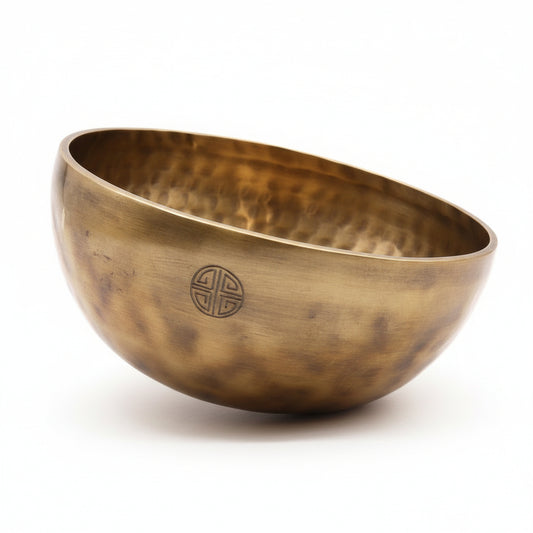 Extra Large Handmade Nepalese Moon Singing Bowl - 22cm, showcasing its exquisite craftsmanship and rich, golden tones, perfect for enhancing meditation. Ideal for a Christmas gift or as a unique home decor piece, this bowl embodies tranquility and harmony.