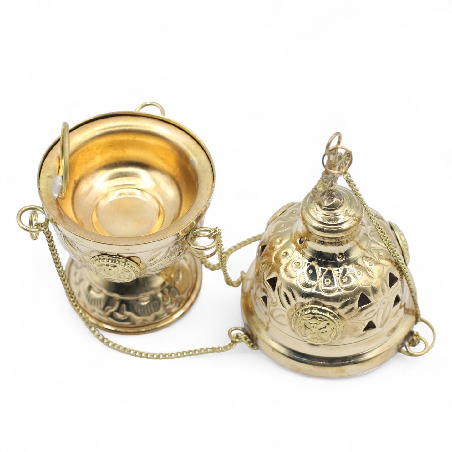 Handcrafted Hanging Brass Incense Burner showcasing intricate engravings and a charming cross finial. This beautiful incense holder, perfect for enhancing your home fragrance, makes a thoughtful Christmas gift.