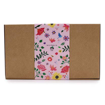 Elegant packaging of the Ylang Ylang & Citrus Bath Salt Set, featuring a floral design, ideal for creating a spa experience at home. Perfect as a Christmas Gift Home Fragrance.