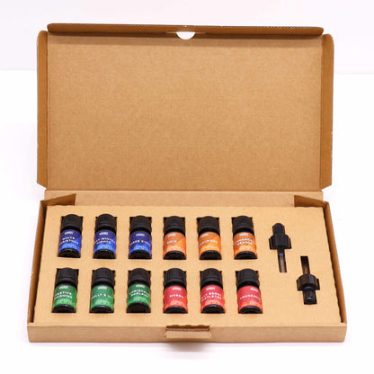 Holy Scents UK-Made Christmas Fragrance Oils Set featuring 12 artisanal bottles, ideal for creating a cozy holiday atmosphere.