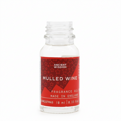 Mulled Wine Fragrance Oil displayed creatively, representing the ideal winter fragrance oil choice for Christmas celebrations.