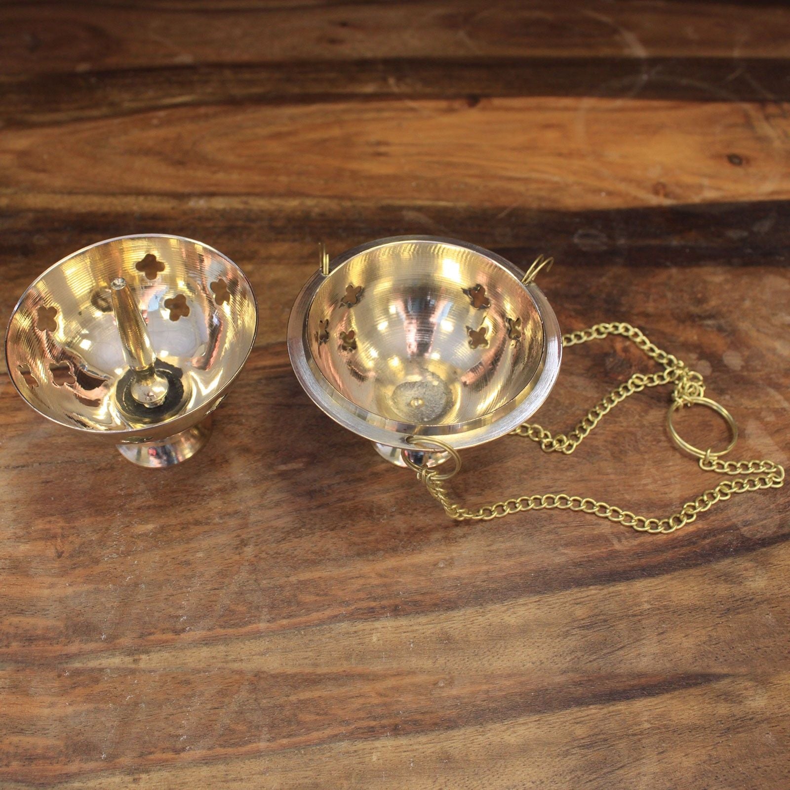 Hanging Brass Incense Burner - Ideal for Meditation & Rituals displayed from a top view showcasing its unique design. This versatile incense burner is perfect for creating aromatic fragrances during meditation or rituals, making it a lovely Christmas gift for home fragrance enthusiasts.