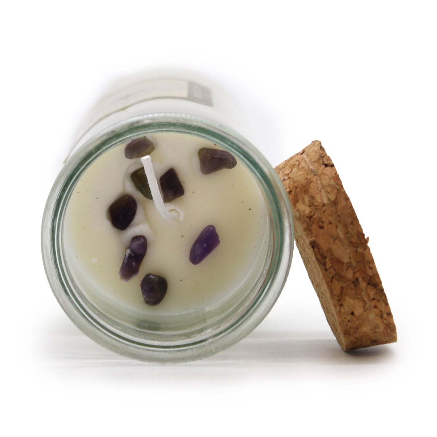 Close-up of Magic Spell Candle with Amethyst & Lavender Fennel showing the gemstones within. Ideal for creating a soothing atmosphere, perfect for a Christmas Gift Home Fragrance.