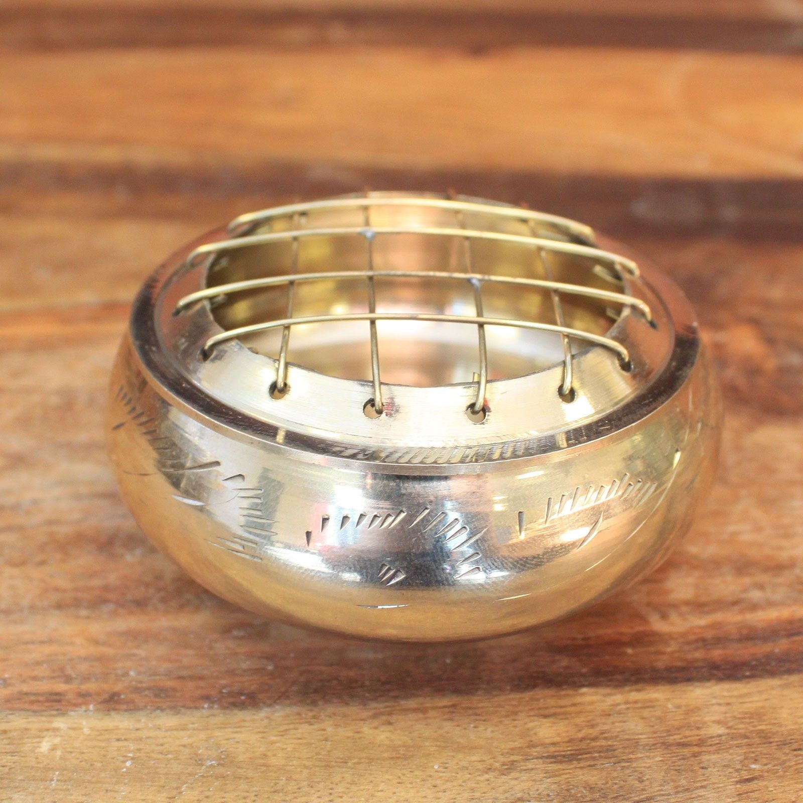 Compact Elegant Brass Charcoal Incense Jar featuring intricate etching and a secure grid lid, designed for safe and tidy aromatic experiences. An ideal home fragrance gift for Christmas. {{scent}} {{product_type}} – Christmas Gift Home Fragrance.