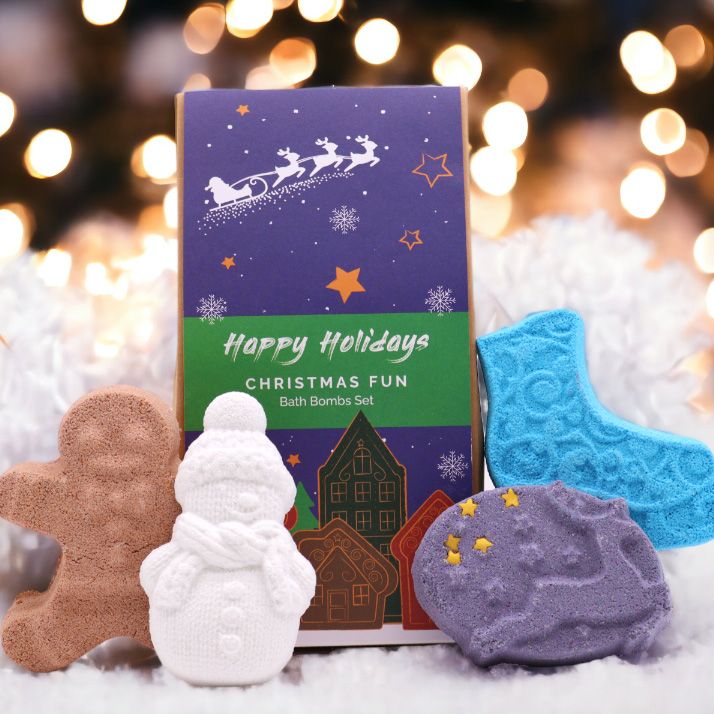 The complete Christmas Fun Bath Bomb Gift Pack featuring various festive bath bombs, beautifully presented. Includes scents like Warm Gingerbread and Frosted Sugar Plum, ideal for holiday gifting, a delightful Christmas Gift Home Fragrance.