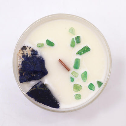 Top view of the Throat Chakra Candle with Sodalite & Jade chips. The calming scent of Gentle Reasons makes this candle an ideal {{scent}} {{product_type}}, perfect for Christmas gifting or home ambience.