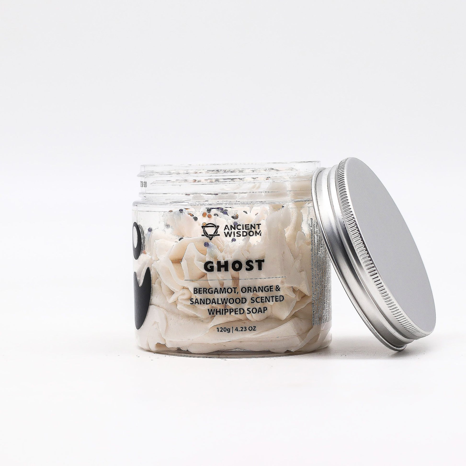 Close-up of Ghost Whipped Soap 120g in a clear jar, showcasing its creamy consistency and festive scent of bergamot, orange, and sandalwood – an ideal Christmas Gift Home Fragrance.