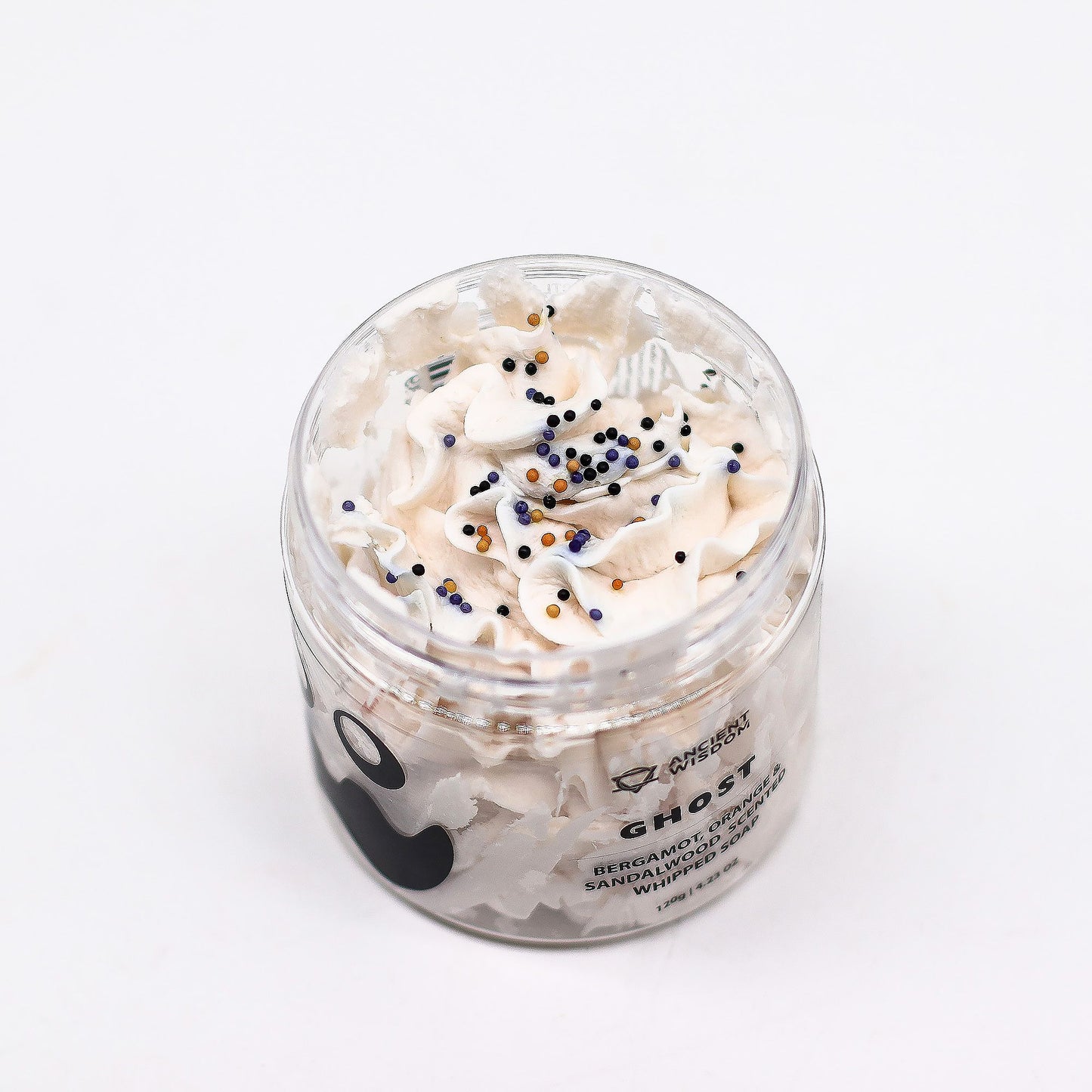 Top view of Ghost Whipped Soap 120g jar highlighting fluffy soap texture with colourful sprinkles, offering a delightful bergamot, orange, and sandalwood scent – a charming Christmas Gift Home Fragrance.