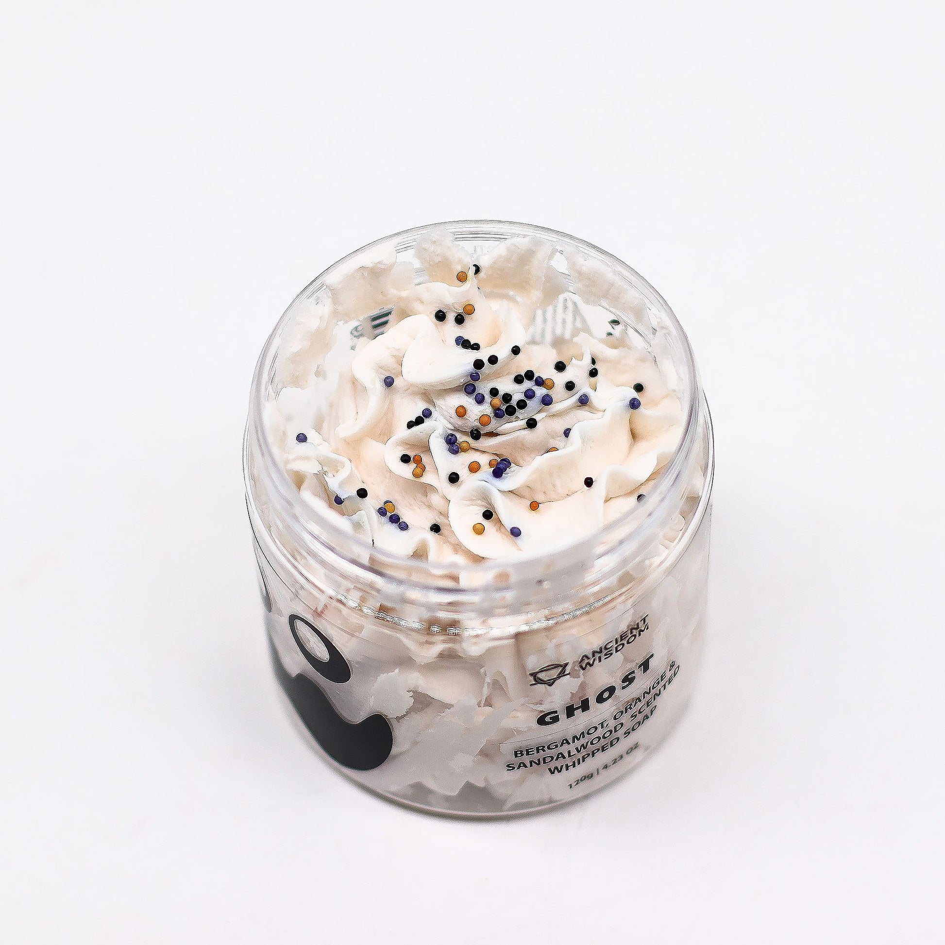 Top view of Ghost Whipped Soap 120g jar highlighting fluffy soap texture with colourful sprinkles, offering a delightful bergamot, orange, and sandalwood scent – a charming Christmas Gift Home Fragrance.