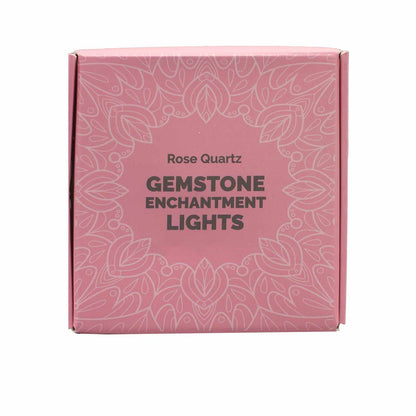 The elegant packaging of Rose Quartz Gemstone Enchantment Lights featuring intricate designs, making it a delightful Christmas gift for those who love unique home accents.