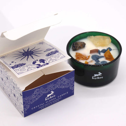 Open box of Hop Hare Crystal Magic Flower Candle revealing the enchanting candle with Citrine and Sodalite. Ideal for adding a unique fragrance touch to your Christmas gifts at home.