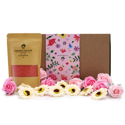 Ylang Ylang & Citrus Bath Salt Set beautifully presented with pink soap roses and sunflowers, perfect for a luxurious spa experience. A great choice for a Christmas Gift Home Fragrance.