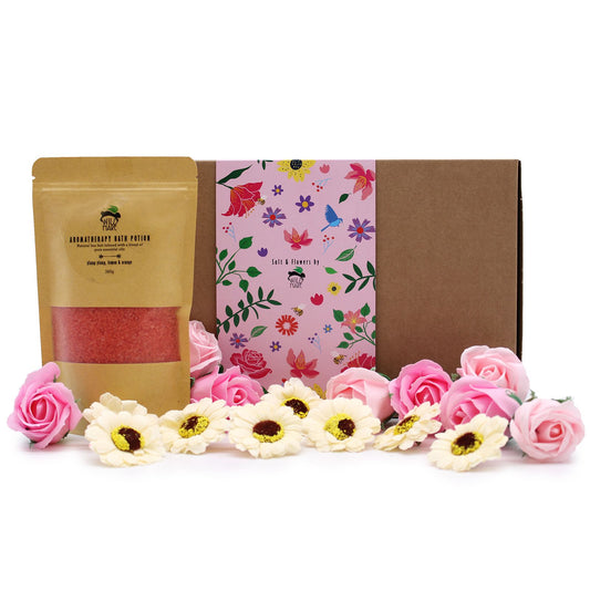 Ylang Ylang & Citrus Bath Salt Set beautifully presented with pink soap roses and sunflowers, perfect for a luxurious spa experience. A great choice for a Christmas Gift Home Fragrance.