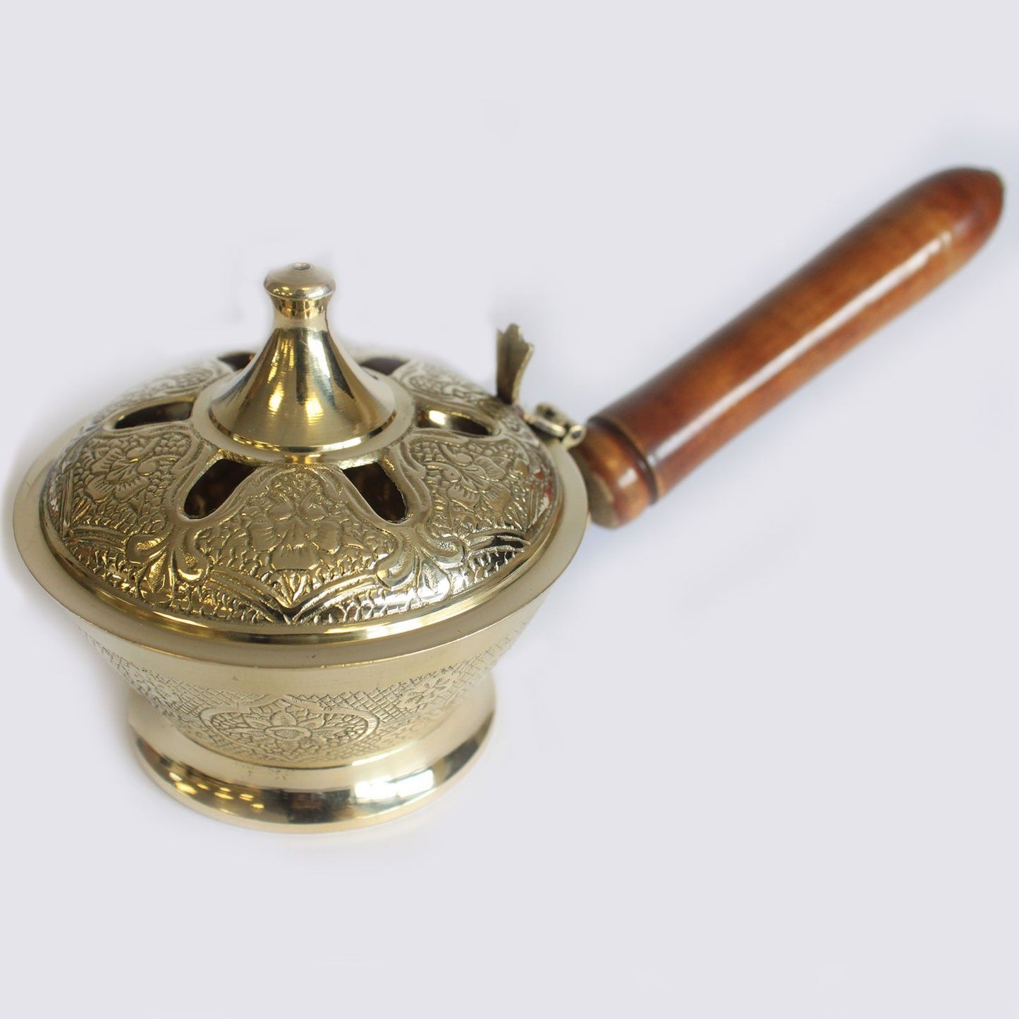 Intricate Brass Censer Incense Burner With Wooden Handle viewed from above, highlighting its detailed design and functionality as a charming scent diffuser. A great choice for home fragrance as a Christmas gift.