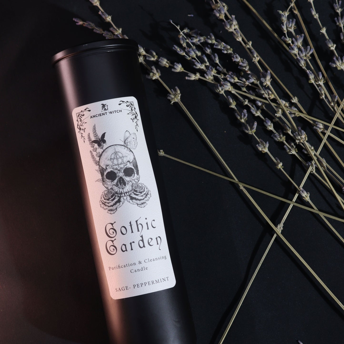 A close-up of the Gothic Garden Candle – Sage & Peppermint for Cleansing Rituals beside soothing lavender, highlighting its invigorating scent. Ideal as a Christmas Gift Home Fragrance.