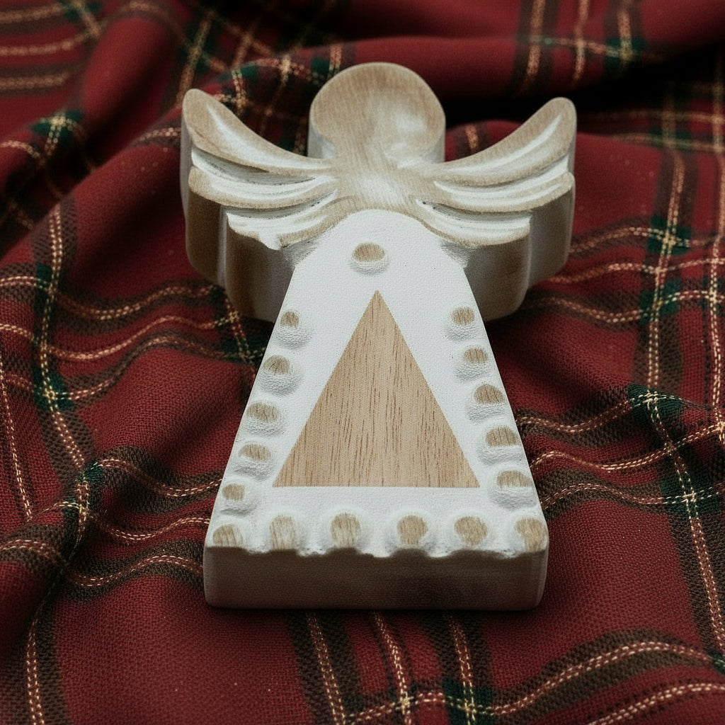 Rustic Whitewashed Mango Wood Angel - Hand-Carved Home Decor. Close-up view of the angel's base, revealing its unique design, making it a delightful addition to your festive decor and gifting ideas.