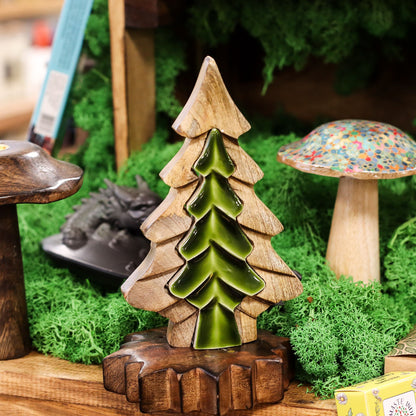Woodland Charm - Small Tree in Tree Decoration 15x10cm beautifully displayed among greenery, ideal for enhancing your Christmas gift home fragrance theme.