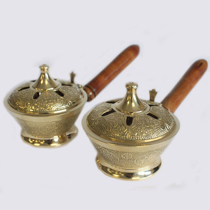 Two Intricate Brass Censer Incense Burners With Wooden Handles displayed together, celebrating their beautiful details and versatility in enhancing home fragrance. An ideal Christmas gift for any fragrance enthusiast.