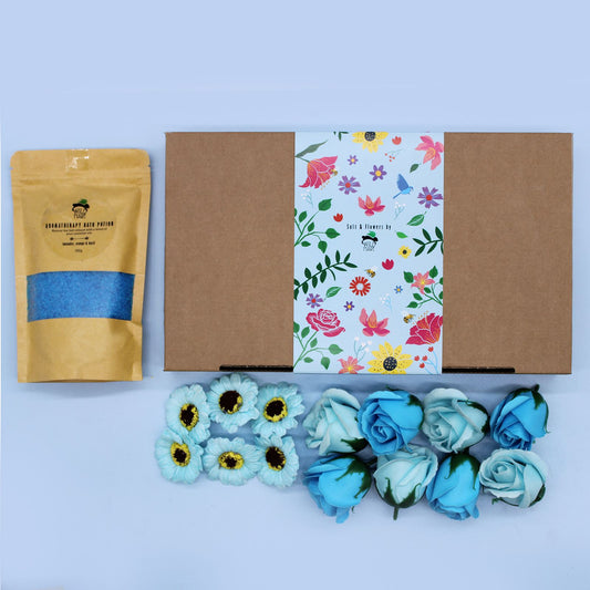 Total Unwind Spa Set - Lavender Bath Salt & Soap Flowers featuring a beautifully presented gift box with lavender bath salt and vibrant blue soap flowers. Ideal for a Christmas gift home fragrance.