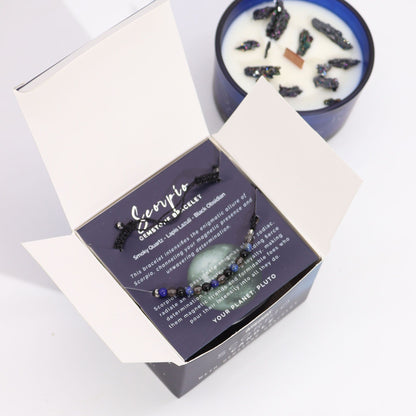 Inside view of the Scorpio Zodiac Crystal Candle with Gemstone Bracelet set, highlighting the unique gemstones and informative card. This enchanting scent makes a thoughtful Christmas Gift Home Fragrance.