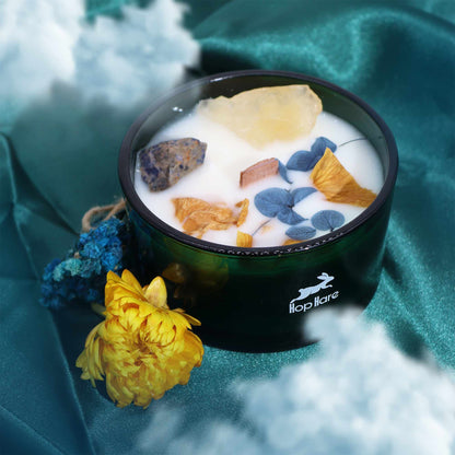 Close-up of Hop Hare Crystal Magic Flower Candle - Citrine & Sodalite, 22Hr Burn Time showcasing gemstones and floral details. Perfect Christmas gift home fragrance.