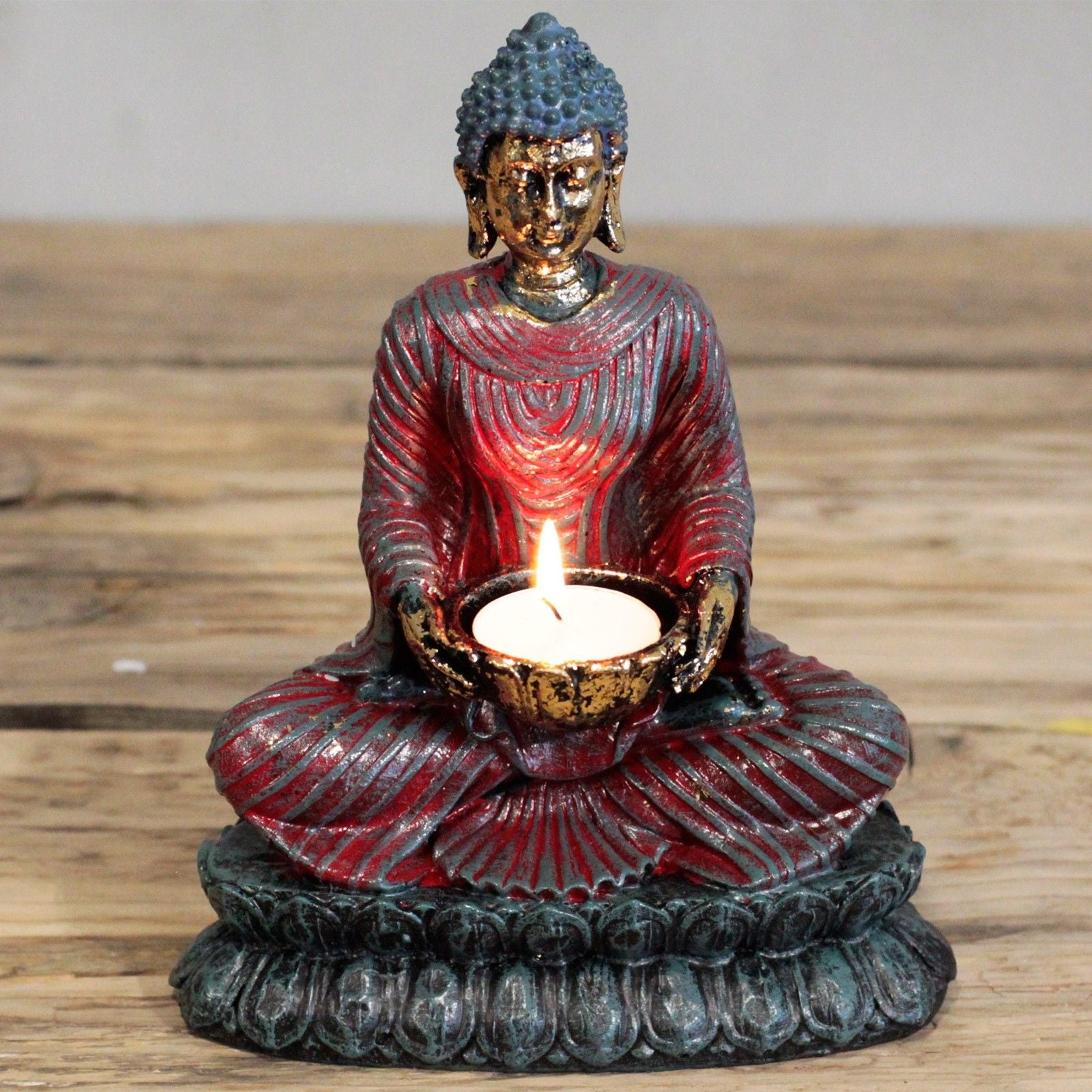 Antique Buddha Candle Holder - Zen Decor for Homes & Meditation featuring a glowing candle held by a beautifully detailed Buddha statue. Adds a peaceful vibe to your space, making it a great {{scent}} {{product_type}} – Christmas Gift Home Fragrance.