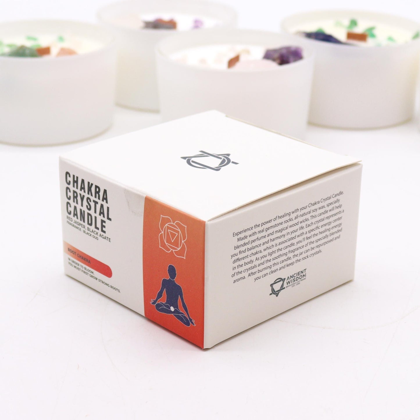 Packaging of the Root Chakra Crystal Candle - Black Oud Scent with Gemstones, emphasizing its calming qualities and energy-enhancing properties. A stylish and thoughtful Christmas Gift Home Fragrance.