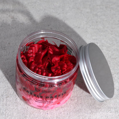 Open jar of Razzle Dazzle Whipped Soap 120g, revealing rich pink and red curls, a delightful Christmas gift choice for those who adore lively home fragrances.