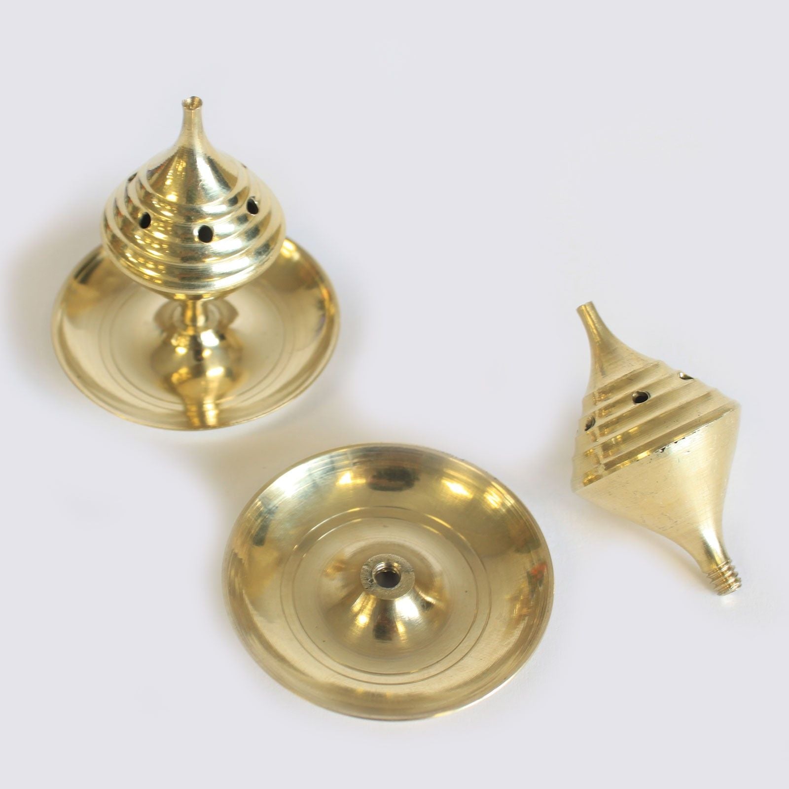Components of the Small Brass Incense Burner - Elegant Design for Meditation, including the domed lid and dish. Perfect for burning incense sticks and cones, this burner is an excellent choice for anyone looking for a stylish Christmas gift that enhances home fragrance.