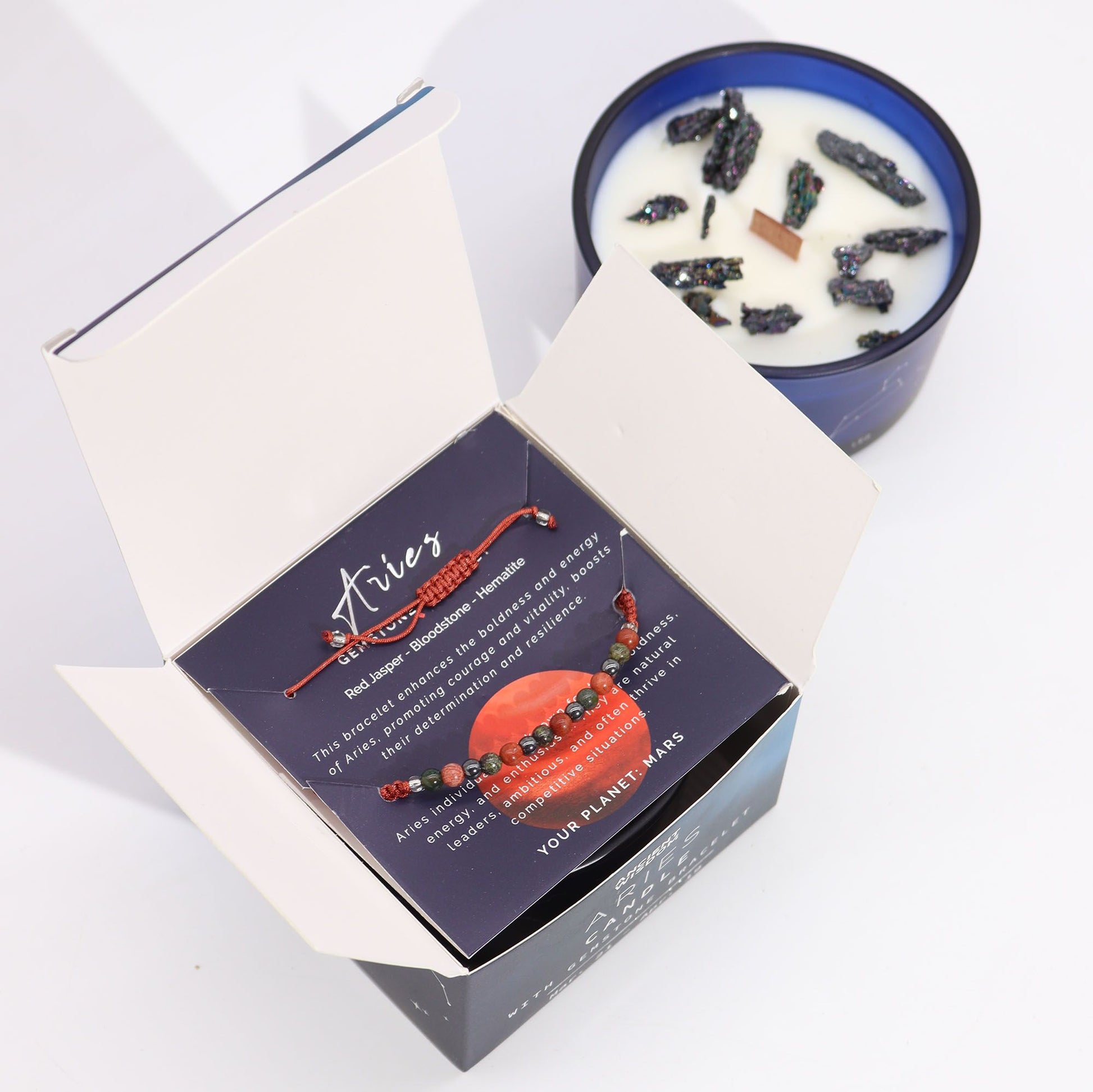 Zodiac Crystal Candle with Gemstone Bracelet - Aries presented inside its open box, revealing the bracelet and candle. The alluring scent of Clear Quartz Freshness adds to its charm, making it a lovely home addition or gift. An excellent selection for Christmas Gift Home Fragrance.