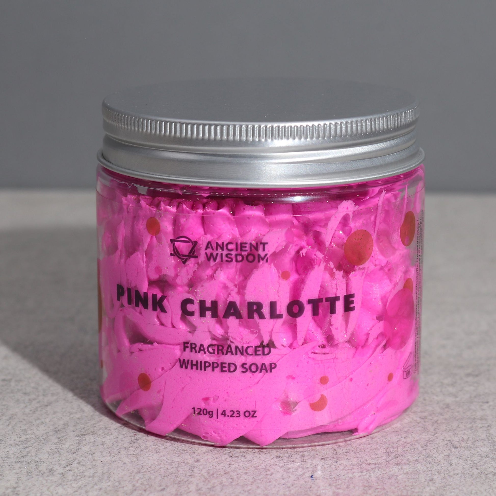 Close-up of Pink Charlotte Whipped Cream Soap 120g in its vibrant jar, showcasing the rich whipped texture. A luxurious {{scent}} {{product_type}} – Christmas gift home fragrance perfect for the holiday season.