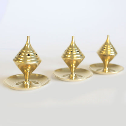 Small Brass Incense Burner - Elegant Design for Meditation showcasing three charming burners. These brass incense burners are perfect for enhancing home fragrance, making an ideal Christmas gift for anyone who loves soothing aromas in their living space.